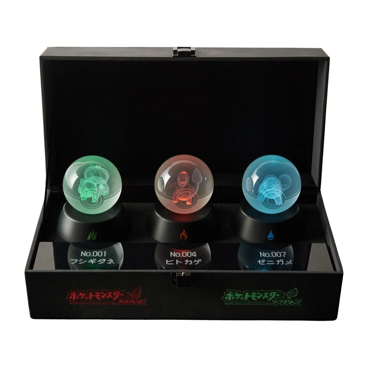 Pokémon FireRed LeafGreen Nintendo Switch esferas de cristal iluminadas con Bulbasaur Charmander y Squirtle grabados en su interior